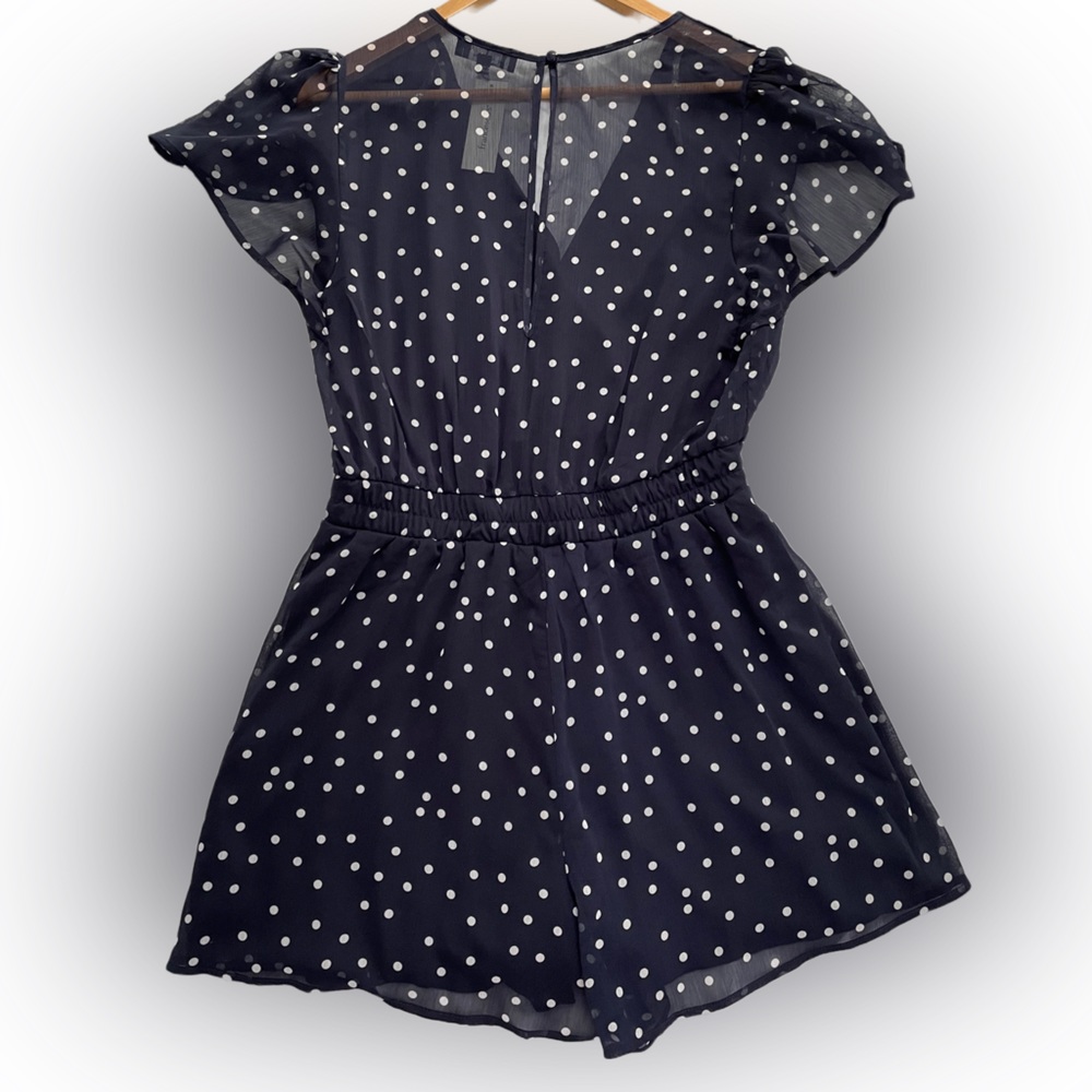 NWT- Francesca’s Jessey Polka Dot Godet Romper Size Medium